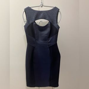 THEIA cocktail sleeveless fitted navy dress front keyhole detail size 6